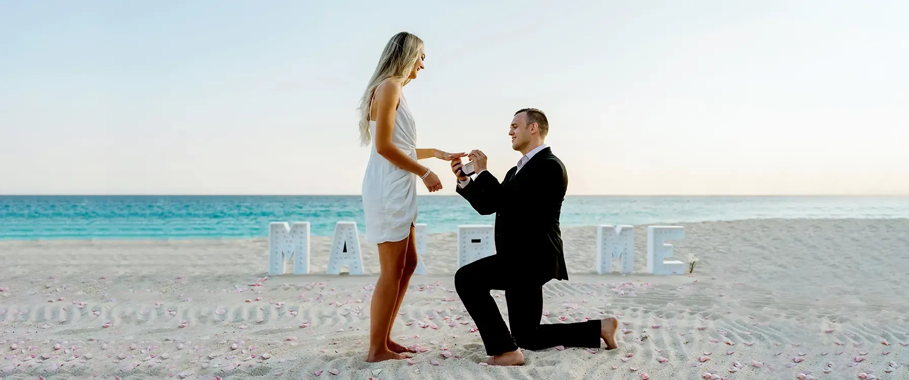 beach_proposal_palace_resorts_weddings.webp